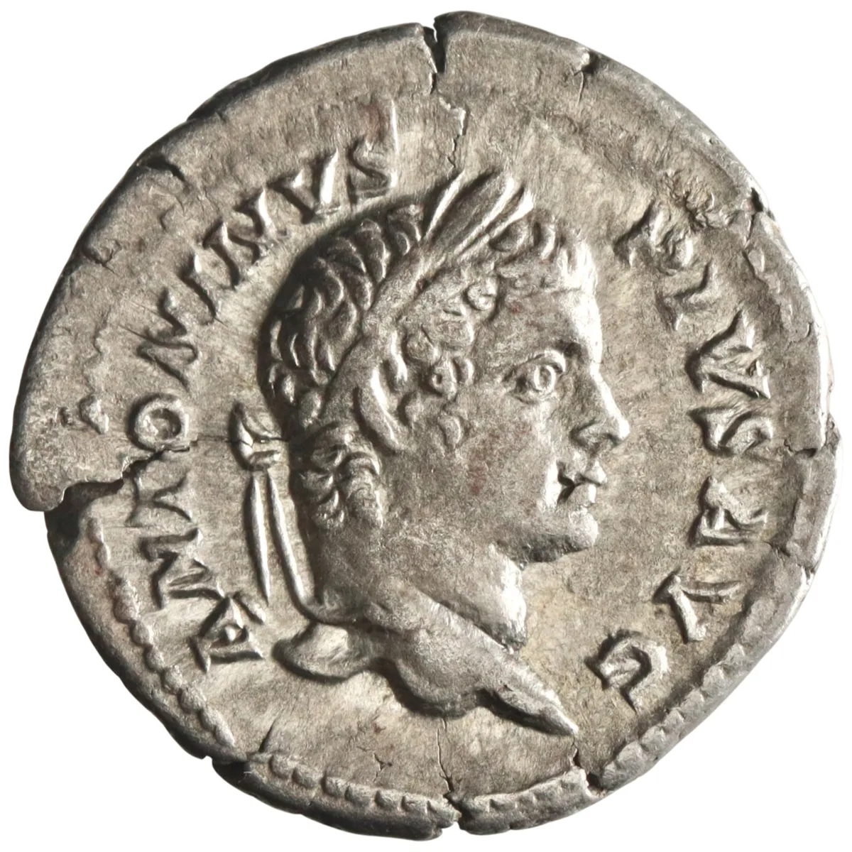 Roman: Caracalla (198-217), silver denarius (3.14g), Rome mint, 206 CE. Laureate draped bust / Mars in military dress standing left leaning on shield holding reversed spear.