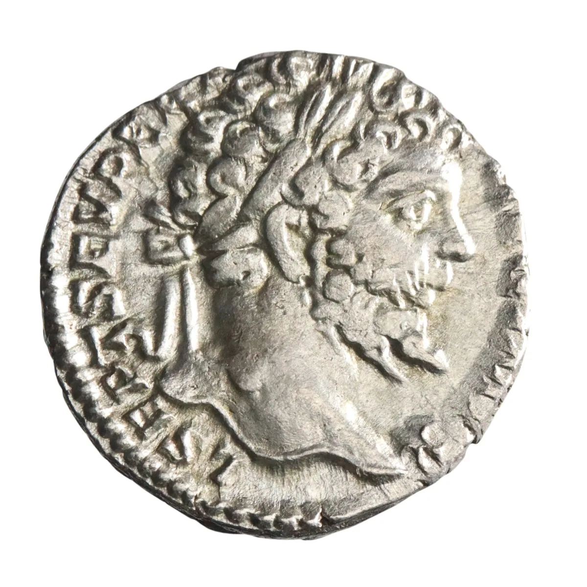 Roman: Septimius Severus (193-211), silver denarius (3.08g), Rome mint, 197-198 CE. Laureate head / Victory walking, holding wreath and palm.