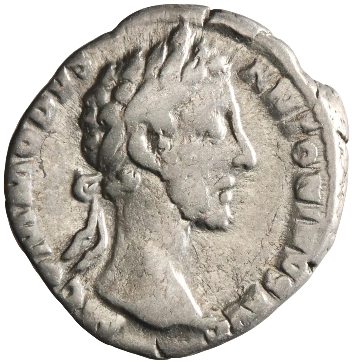 Roman: Commodus (179-192), silver denarius (3.23g), Rome mint, 180-181 CE. Laureate head right / Roma seated left, holding Victory and spear.