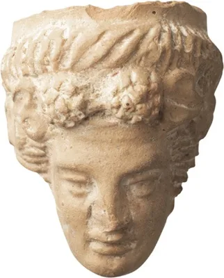 Greek Tanagra Terracotta Head of a Young Bacchus