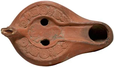 Roman North African Terracotta Oil Lamp with Image of Crouching Lion