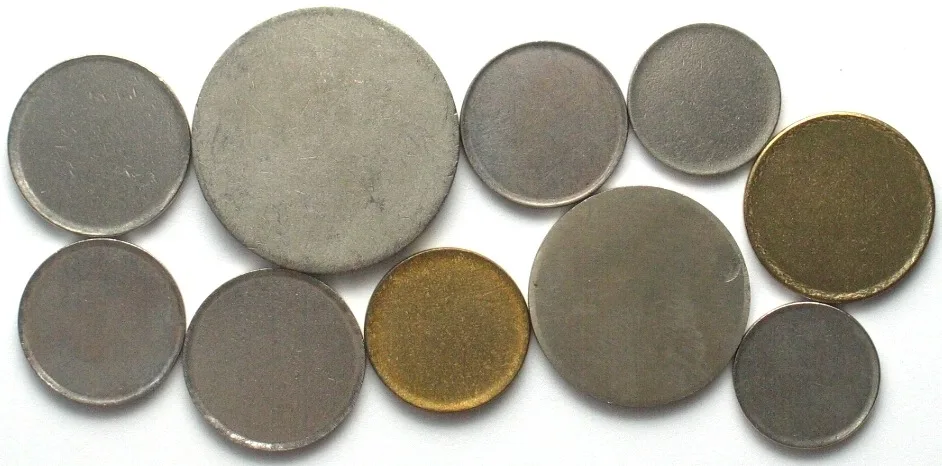 1920-1990 10 base metal planchets for international coins 1920-1990 UNC