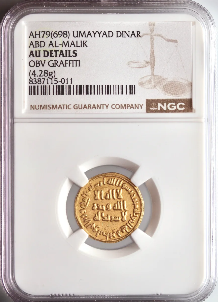 Umayyad: 'Abd al-Malik (685-705), gold dinar (4.28g), AH 79 (698-699 CE). Early date. NGC AU Details - Obv Graffiti.