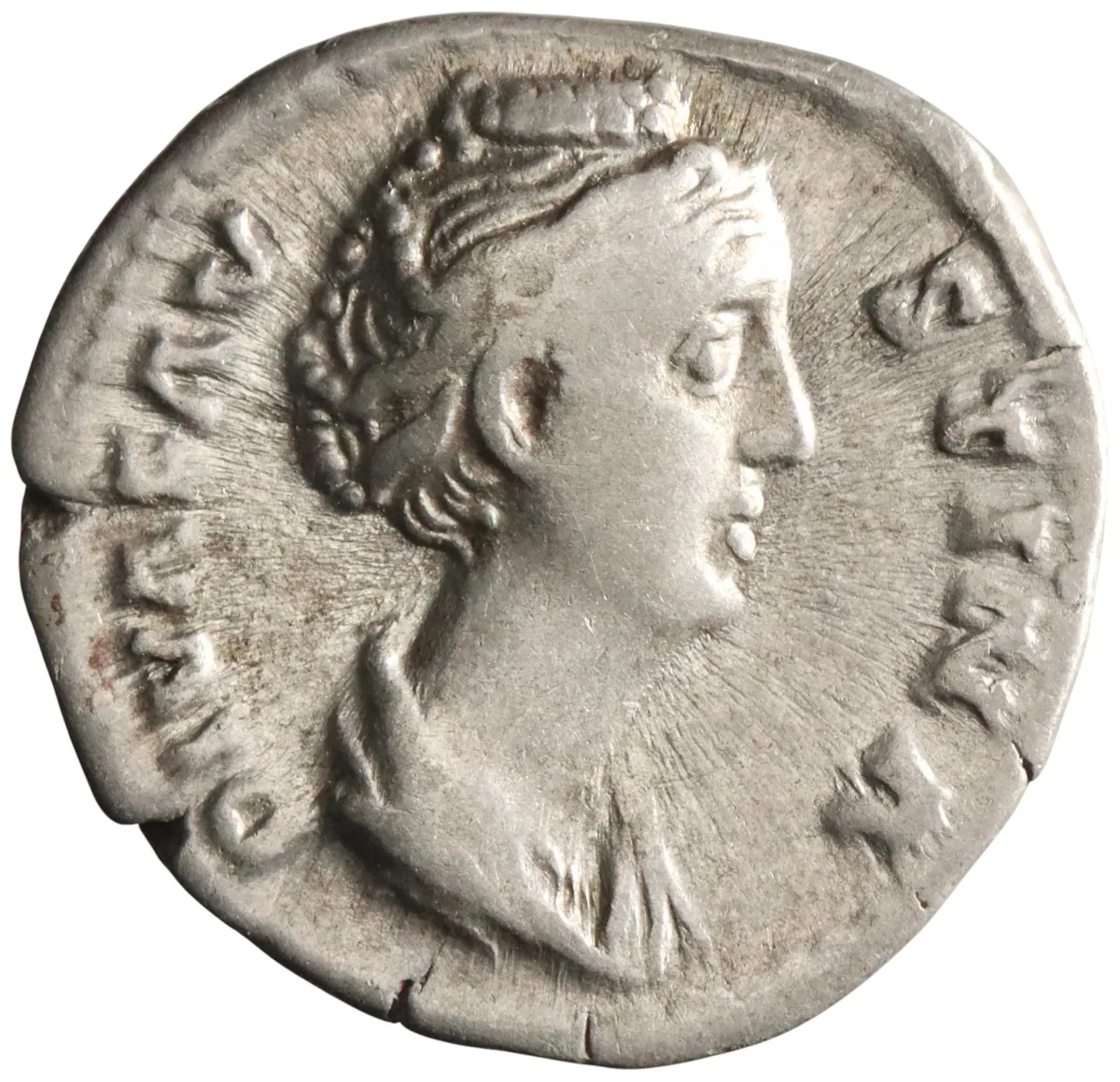 Roman: Diva Faustina I (died 141), silver denarius (3.25g), Rome mint, after 141 CE. Diademed and draped bust right, hair coiled on top of head / Ceres standing left, holding short torch and sceptre.