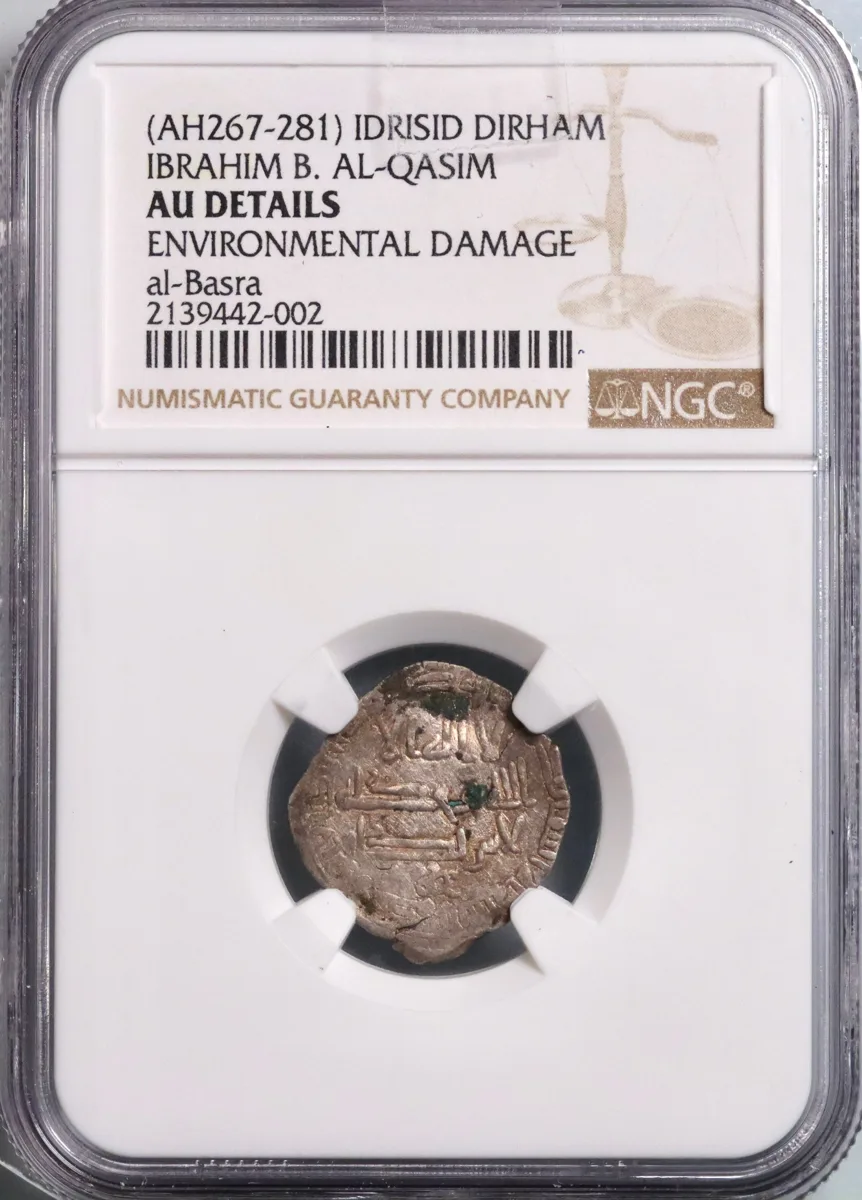 Idrisid: Ibrahim ibn al-Qasim (880-899), silver dirham, al-Basra (in Morocco) mint, AH 280 (893-894 CE). NGC AU Details -Environmental Damage. Extremely rare.