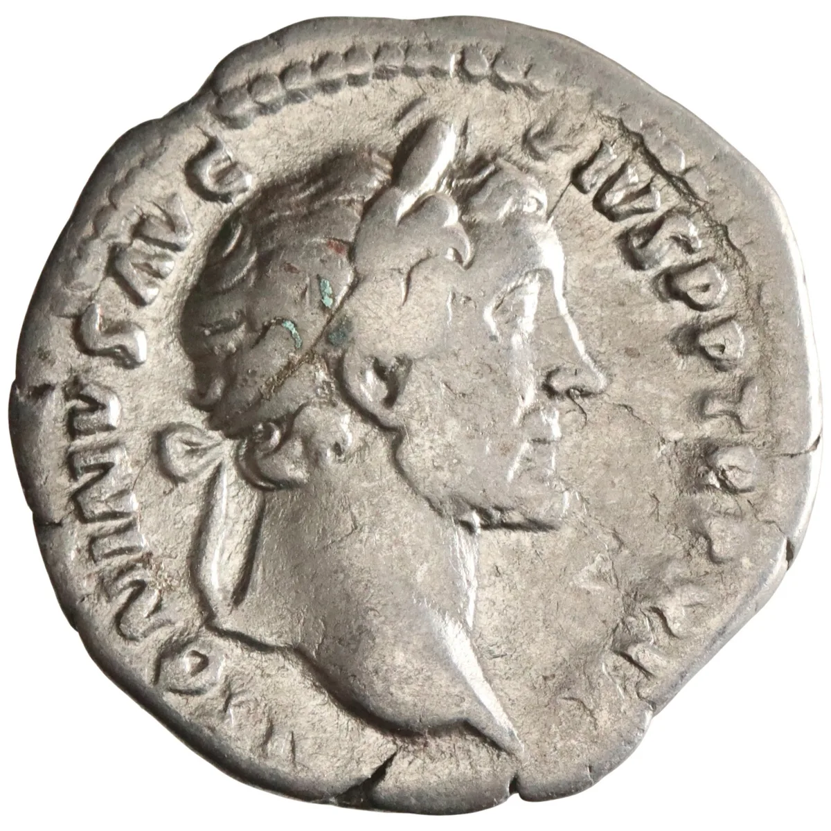 Roman: Antoninus Pius (138-161), silver denarius (3.43g), Rome mint, 138-161 CE. Laureate head right / Vesta standing left by altar, holding patera and palladium.