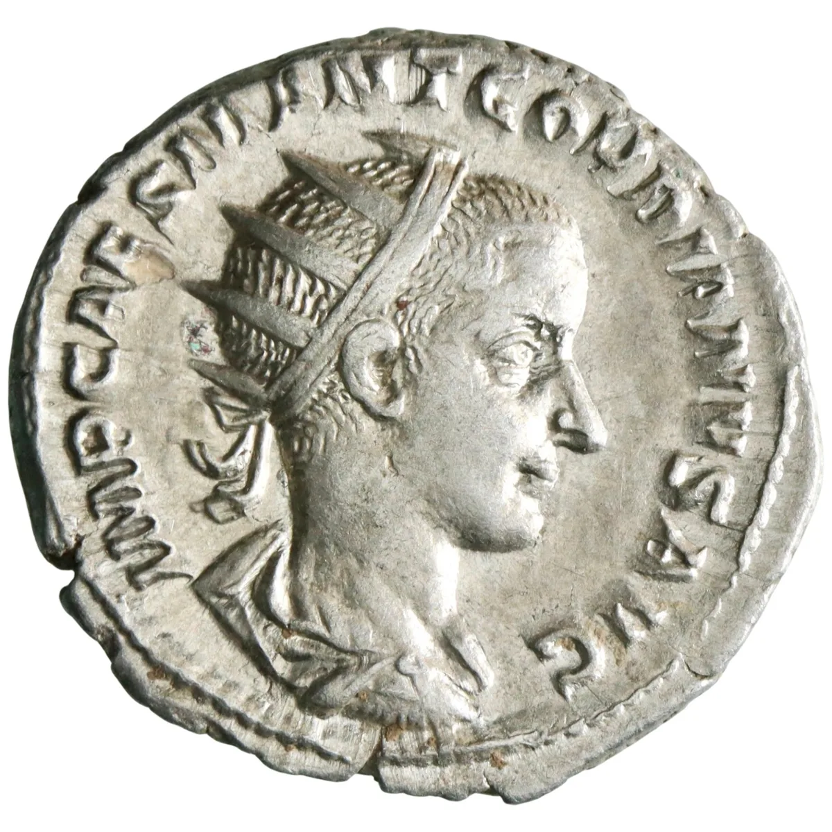 Roman: Gordian III (238-244), silver antoninianus (4.49g), Rome mint, 238-244 CE. Victory walking left with wreath and palm.