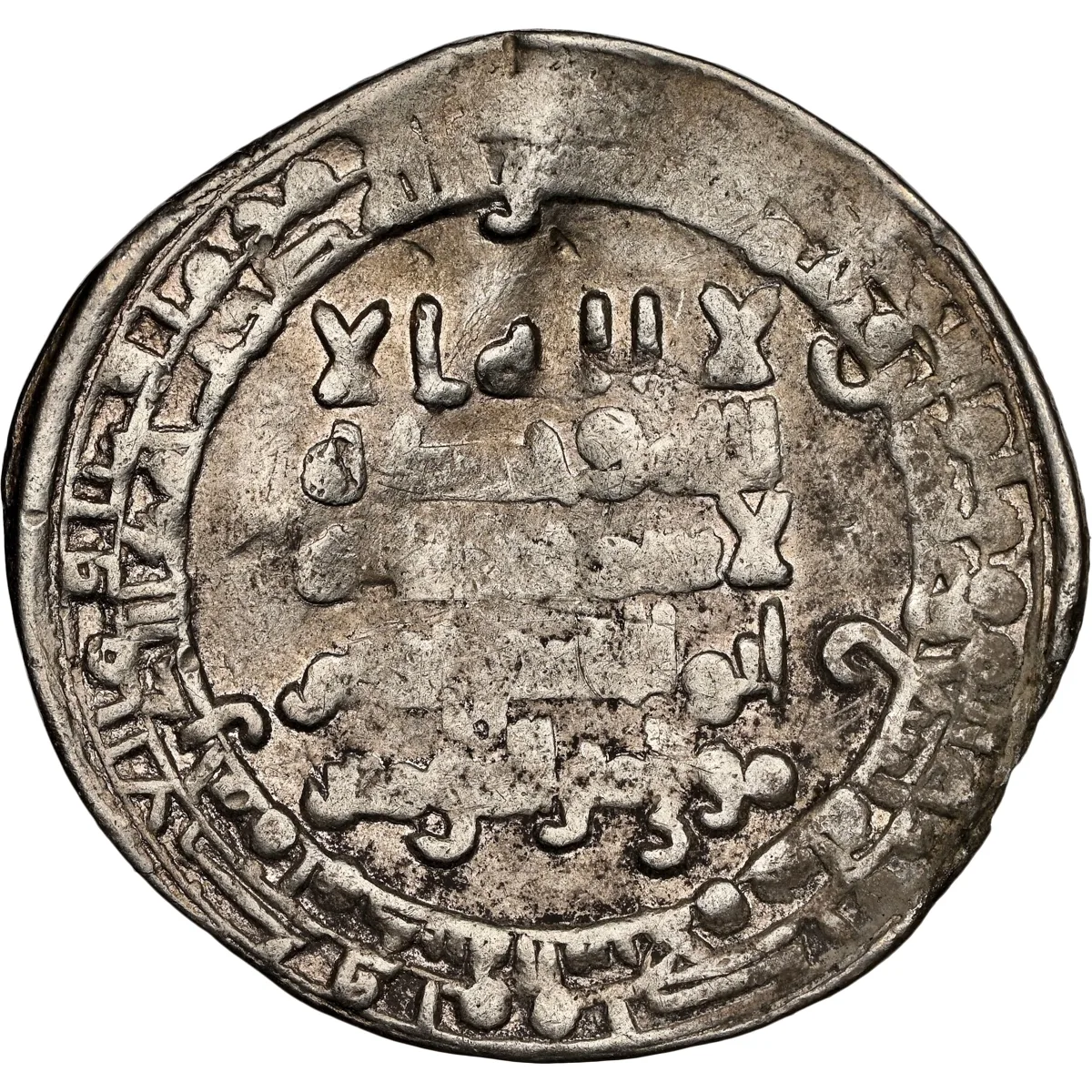 Abbasid: al-Muttaqi (940-944), silver dirham, Madinat al-Salam (Baghdad) mint, AH 329 (940-941 CE). Citing chief amir Abu al-Husayn Bajkam and his title "mawla amir al-mu'minin". Rare. NGC XF45.