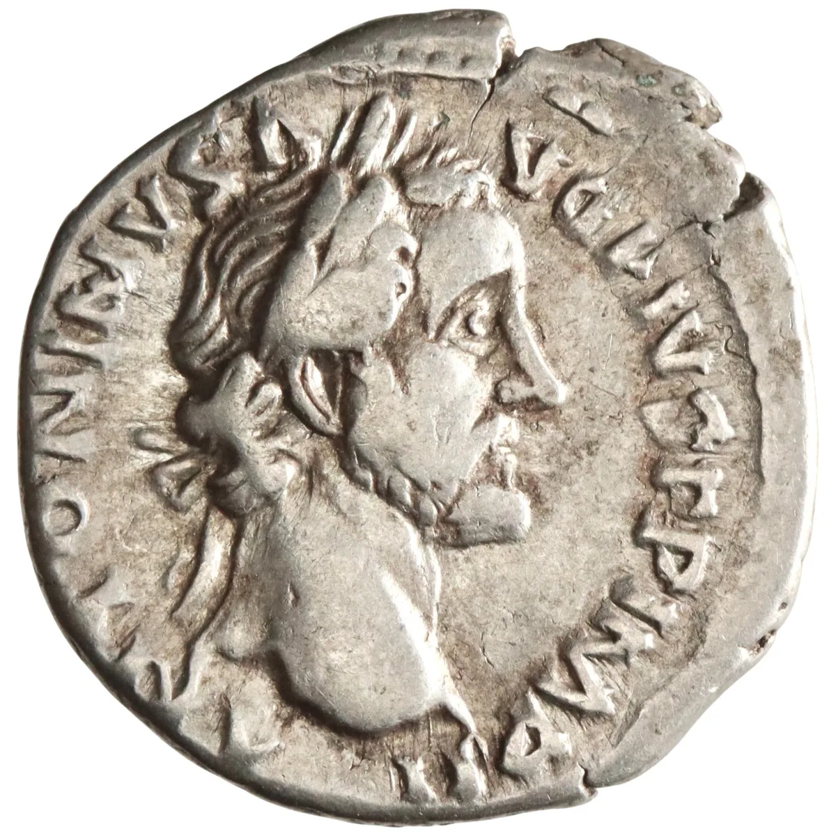 Roman: Antoninus Pius (138-161), silver denarius (3.20g), Rome mint, 156 CE. Laureate head right / Pax standing left, holding olive branch and cornucopiae.