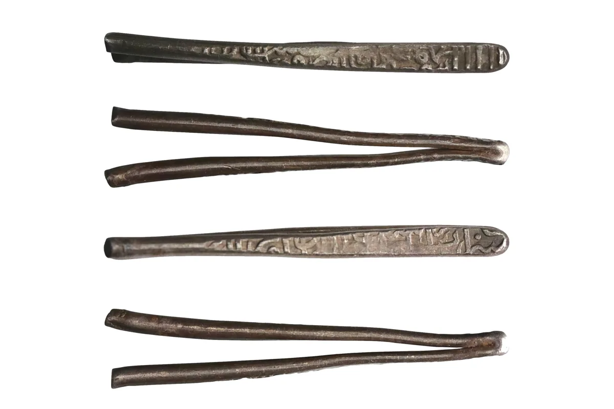 Safavid: silver larin (4.89g), 1500s-1600s CE. Silver "hairpin" larins were issued for circulation in the Arabian Sea, Gulf, and coastal regions of the Indian Ocean.