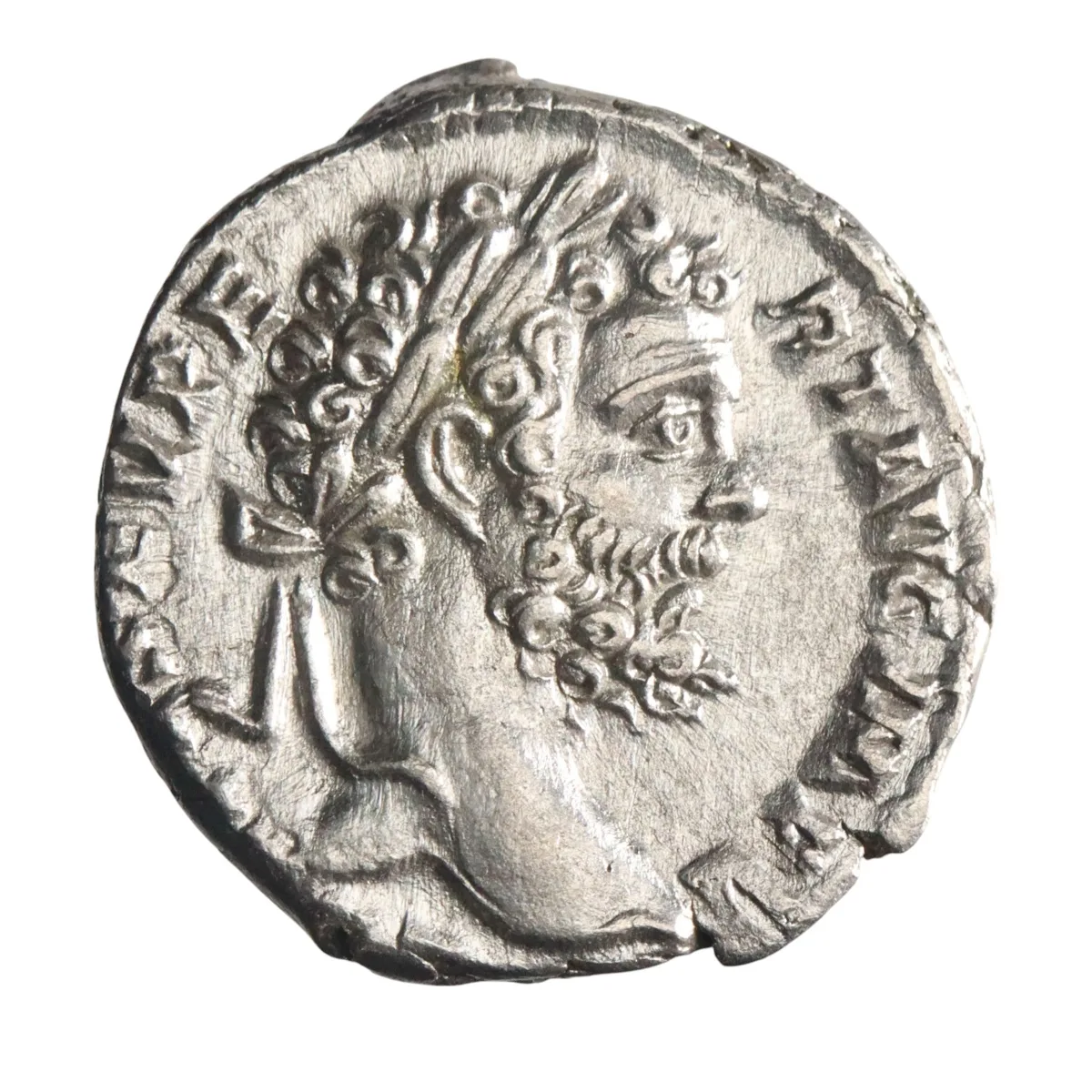 Roman: Septimius Severus (193-211), silver denarius (3.43g), Rome mint, 195 CE. Laureate head / Minerva standing, holding spear and round shield.