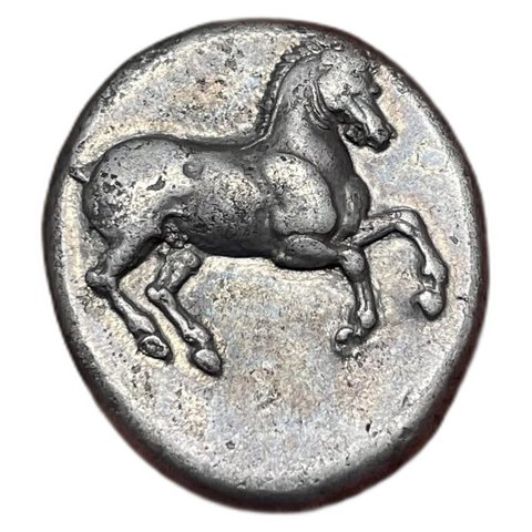 The coin, obverse